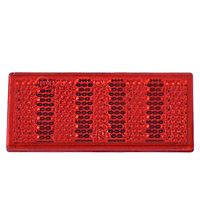 Refletor vermelho 76x34 mm com fita adesiva